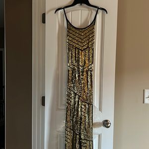 Medium size black and gold sequins jumpsuit